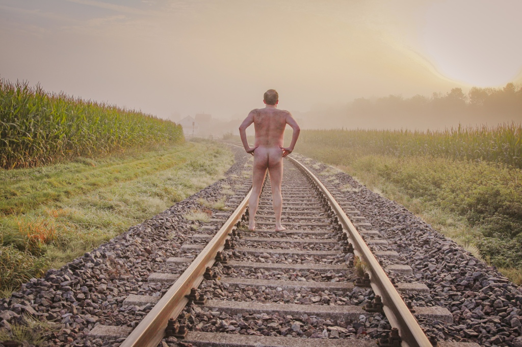 Nude Walk on a Railway Line in October